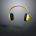 Stylish Wired Yellow Headphones With Orange Headband And Black Ear Cups On Gray Background