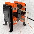 Black And Orange Industrial Equipment Featuring Metal Frame Stands And Connecting Rod Components