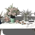 Assorted Decorative Vases With Mixed Dried Fresh Flowers On Marble Tabletop With Small Decor Items