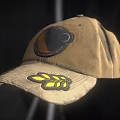 Vintage Brown Cotton Hat with Circular Badge and Yellow Leaf Patch