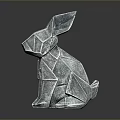 Modern Metallic Origami Rabbit Figurine With Geometric Folds And Shiny Surface Reflection