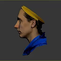 Portrait of a Man Wearing Yellow Headband and Blue Hoodie Against Gray Background