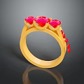 Elegant Gold Ring With Three Red Gemstones And Small Red Accents Fashion Jewelry