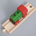 Colorful Red And Green Electric Toy Trains With Black Wheels And Brio Logo