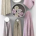 Soft Decorative Towels Hanging And Rolled In Bowls Lavender Light Gray With Textured Edges