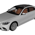 Silver Luxury Sedan With Sleek Exterior Design And Red Leather Seats