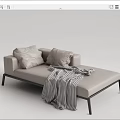 Modern Beige Chaise Lounge with Plush Pillows Checkered Blanket and Metal Legs