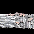 Old Broken Corrugated Metal Roof With Rusted Red Patches And Fragments