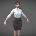 Business Woman In White Shirt And Black Skirt Standing Against Gray Background