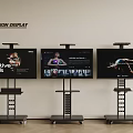 Multiple Television Displays On Mobile Stands Showing Creative Content And 3d model