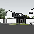 White Guesthouse Building With Black Roofs Front Lawn Trees And Parked Cars