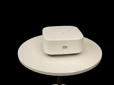 White MI Bluetooth Speaker on White Round Table for Home Audio Experience 3d model
