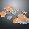 Scattered Broken Fragments of Orange and White Materials with Small Metallic Debris