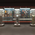 Museum Exhibition Hall Featuring Red Display Stands Mannequins Glass Cases And Bright Lighting