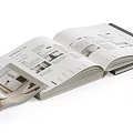Various Open Books and Magazines Displaying Text and Image Content 3d model