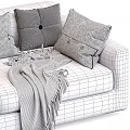 Comfortable Beige Multi Seater Sofa With Plaid Striped Blankets And Decorative Pillows