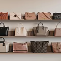 Various Stylish Handbags Displayed On Shelves With Different Colors And Designs