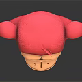 Red Monkey Head Sculpture With Exaggerated Grin And Cartoon Facial Features