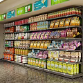 Retail Display Shelves Stocked With Various Snacks Drinks And Packaged Goods In Modern Store
