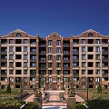 Multi Story Brick Residential Building With Front Courtyard Lush Greenery And Decorative Windows