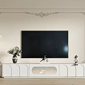 Modern White TV Cabinet with Decorative Items Floor Lamp Against Ornate Wall Panels