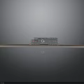 Grey Model Train On Track Display With Detailed Exterior And Reflection
