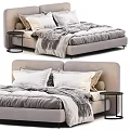Double Bed with Beige Upholstered Headboard White Pillows Gray Blanket and Black Nightstand