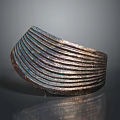 Copper Sculpture With Wavy Stripes And Shiny Surface In Circular Design