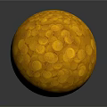Shiny Golden Sphere With Coin Like Circular Patterns On Dark Surface