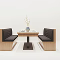 Modern Public Seating With Wooden Frame Black Padded Seats And Table With Vase Tableware