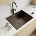 Black Stainless Steel Kitchen Sink with Modern Faucet and Glass Cups on Light Countertop