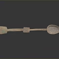 Ancient Copper Spoon Sculpture with Intricate Carved Handle and Detailed Bowl Design