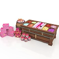 Wooden Table With Divided Compartments Holding Colorful Candies Pink Boxes Small Jars And Wooden Barrel