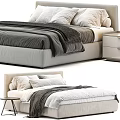 Modern Double Bed With Beige Frame White Sheets Dark Blanket Pillows And Side Table