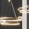 Modern Circular Illuminated Chandelier With Golden Rings And Cloud Shaped Decorations In Interior