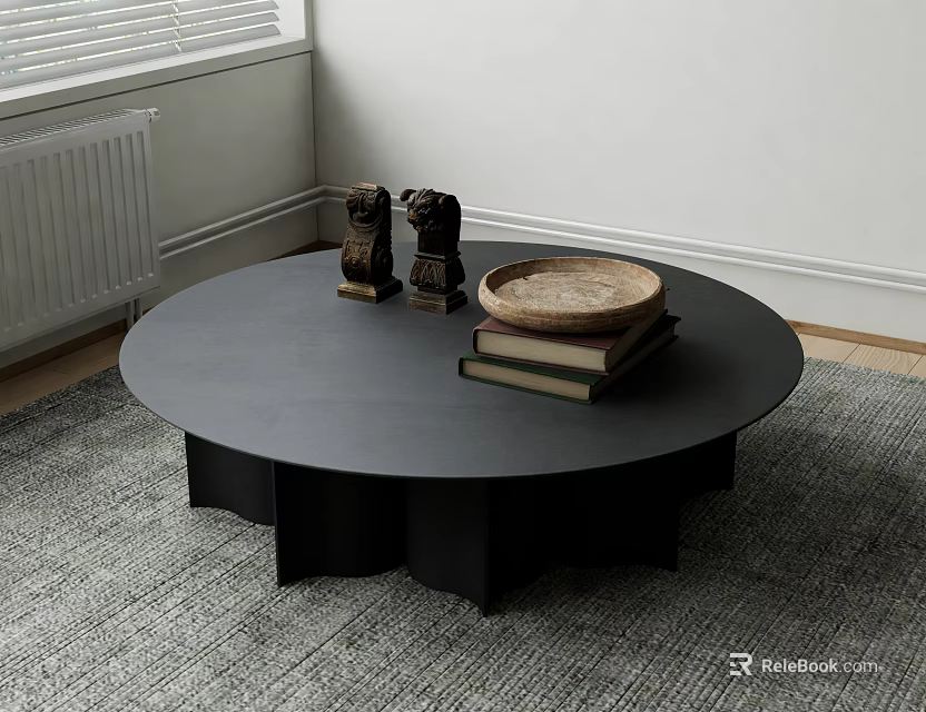 Round Black Coffee Table On Gray Rug With Small Sculptures Wooden Tray And Stacked Books 3d model 