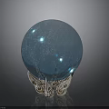 Shiny Blue Glass Sphere Decorative Art Piece With Intricate Silver Base Stand