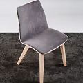 Modern Accent Chairs Featuring Wooden Legs Upholstered Velvet Seats And Unique Backrest Design