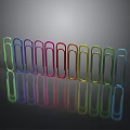 Colorful Paper Clips Arranged In A Row With Shiny Reflections On Sleek Surface
