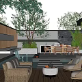 Modern Garden Outdoor Living Space With Wooden Deck Wicker Sofa And Lush Green Plants