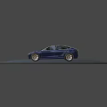 Blue Tesla Electric Sedan With Modern Sleek Design And Alloy Wheels