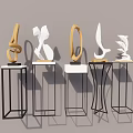 Modern Abstract Sculptures with Unique Shapes on Metal Geometric Stands