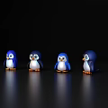 Four Cute Blue Penguin Figurines Arranged On Black Reflective Surface