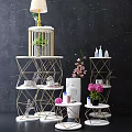 Golden Geometric Display Shelves Multi Tiered With Green Plants Pink Flowers And Vases
