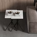 Modern Side Table With Marble Top And Black Metal Legs In Living Room