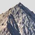 Mountain Peak With Rocky Texture And Sunlit Slopes In Natural Landscape