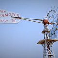 Aermotor Chicago Industrial Windmill Equipment With Metal Blades And Tall Tower Structure