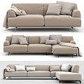 Beige Sectional Sofa With Plush Pillows Cozy Blanket And Metal Legs In Modern Living Room