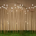 Outdoor Decorative Lights Featuring Slender Golden Poles And Round Bulbs On Green Grass