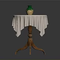 Round Wooden Table With White Fringed Tablecloth And Green Beige Vase